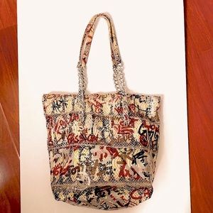 Fatto a mano by Carlos Falchi python graffiti tote. Make me a reasonable offer